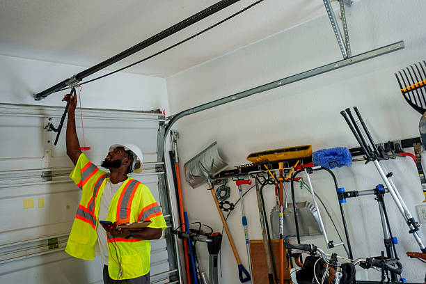 Professional Garage Door technician working in Brownlee Park, MI